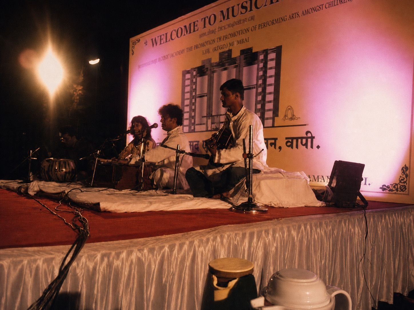 Ghazal Night for Larsen & Toubro Switchgear: the ensemble under the branded backdrop
